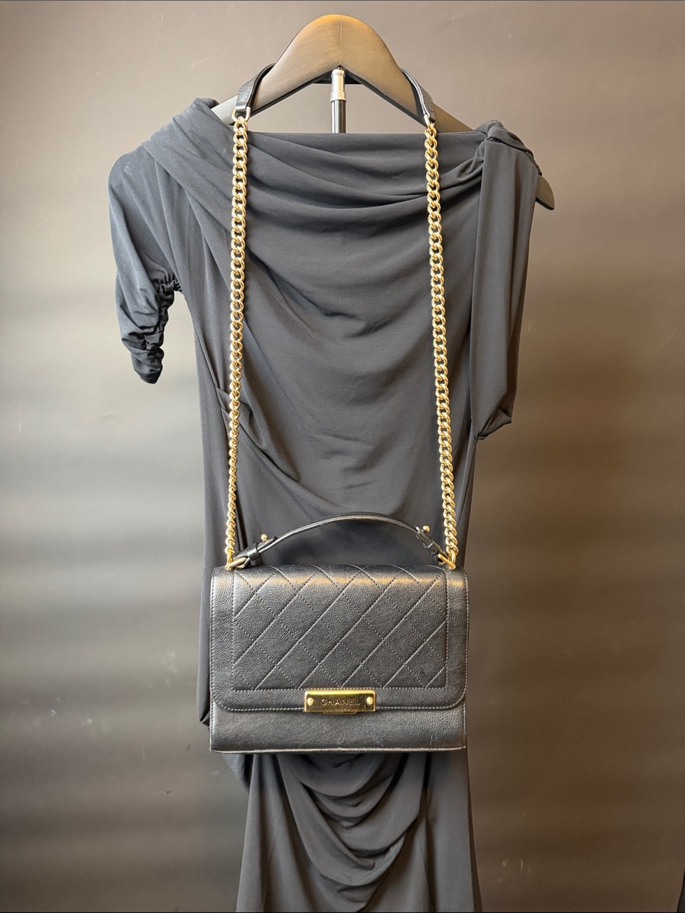 CHANEL Black Quilted Leather Crossbody Bag with Gold Chain